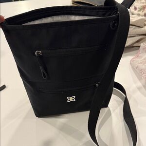 Sherpani Black Crossbody Bag with White Accent